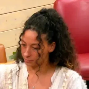 Angelina seated playing mid-stakes cash game poker on the Poker At The Lodge livestream.