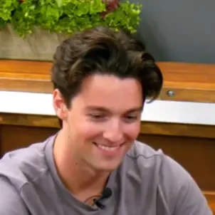 Austin seated playing mid stakes cash game poker on the Poker At The Lodge livestream.