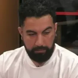 Bam seated playing high stakes cash game poker on the Hustler Casino Live stream.