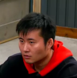 Bear seated playing low stakes cash game poker on the Poker At The Lodge livestream.