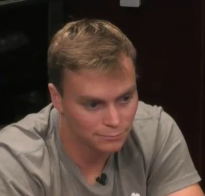 Ben seated playing mid-stakes cash game poker on the Hustler Casino Live stream.