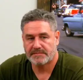 Brendon seated playing high stakes cash game poker on the Poker At The Lodge livestream.