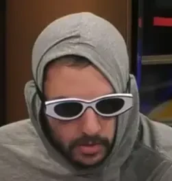 Chad "Cbles" Bleznick seated playing mid-stakes cash game poker on the Hustler Casino Live stream.