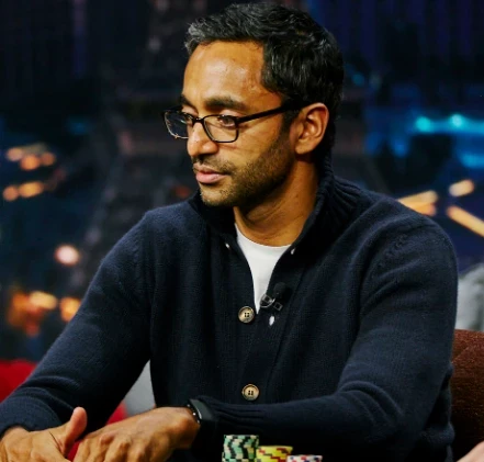 Chamath Palihapitiya seated playing high stakes cash game poker on Poker After Dark. 
