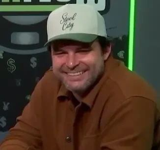 Charlie Ansanelli seated playing high stakes cash game poker on PokerGO.