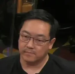 Charlie Lee seated playing high stakes cash game poker on the Hustler Casino Live stream.