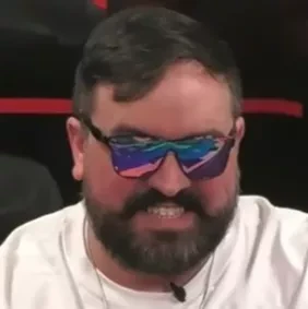 Chief seated playing high stakes cash game poker on the Hustler Casino Live stream.