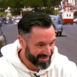 Chris seated playing low stakes cash game poker on the Poker At The Lodge livestream.