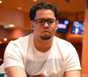 Christian Soto aka "Chin" seated playing high stakes cash game poker on livestream. 