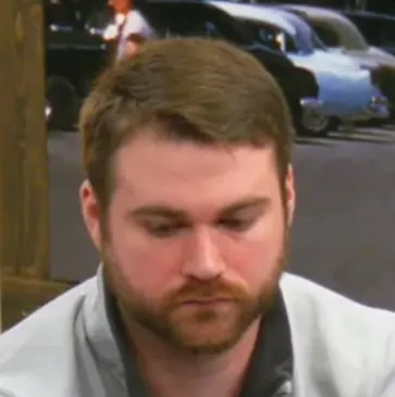 David seated playing mid-stakes cash game poker on the Poker At The Lodge livestream.