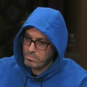 David seated playing high stakes cash game poker on the Hustler Casino Lives stream.