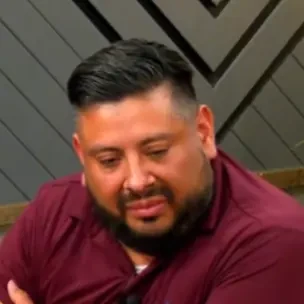 David G seated playing high stakes cash game poker on the Poker At The Lodge livestream.