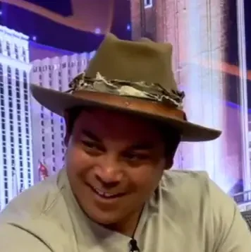 Eric Garma seated playing high stakes cash game Big-O Poker on the Venetian Poker Live stream.