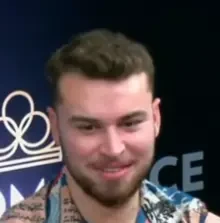 Evan seated playing high stakes cash game poker on the Bally Live Poker livestream.