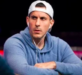 Haralabos Voulgaris seated playing high stakes cash game poker at Hustler Casino Live.