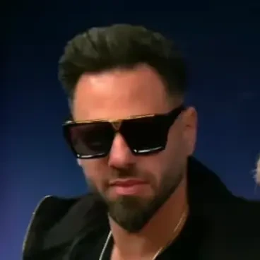 Itay seated playing mid-stakes cash game poker on the Bally Live Poker livestream.