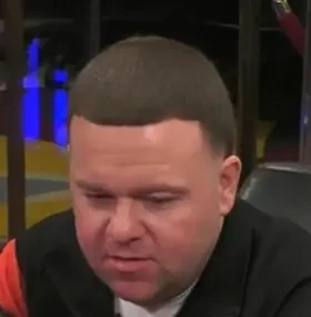 Jeff Nadu seated playing mid-stakes cash game poker on the Hustler Casino Live stream.