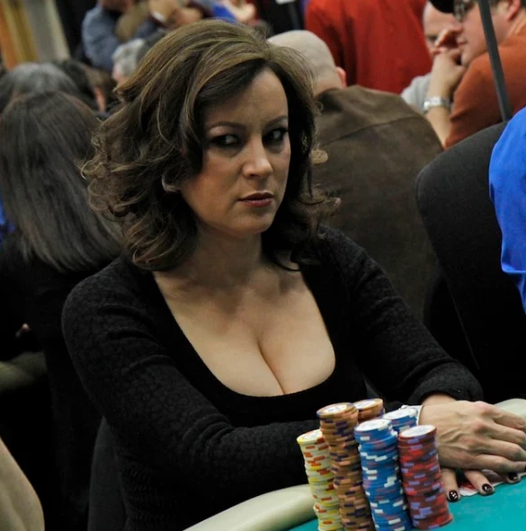 Jennifer Tilly seated playing high stakes cash game poker on livestream.