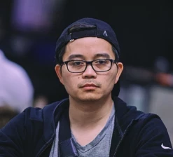 Ky Nguyen aka "Suited Superman" seated playing high stakes cash game poker on Hustler Casino Live. 