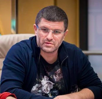 Leon Tsoukernik seated playing high stakes cash game poker on PartyPoker Live.