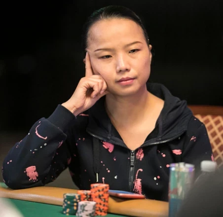 Linglin Zeng seated playing high stakes cash game poker at Hustler Casino Live.