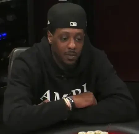 Mario Chalmers seated playing high stakes cash game poker on Hustler Casino Live