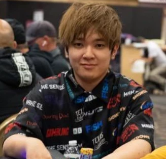 Masato Yokosawa seated playing high stakes cash game poker on Poker At The Lodge.