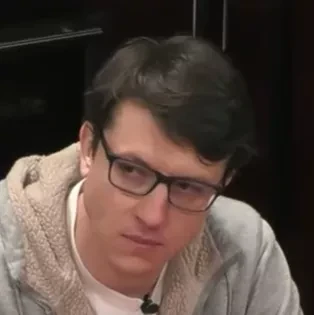 Max seated playing high stakes cash game poker on the Hustler Casino Live stream.