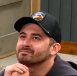 Mike seated playing mid-stakes cash game poker on the Poker At The Lodge livestream.