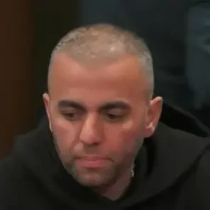 Mike seated playing high stakes cash game poker on the Hustler Casino Live stream.