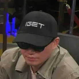 Mike Iget seated playing high stakes cash game poker on the Hustler Casino Live stream.