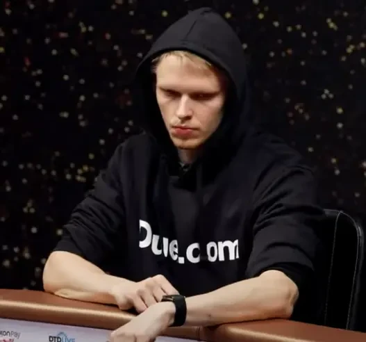 Monarch, CEO of Duel, seated playing high stakes cash game poker