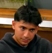 Nehal seated playing mid-stakes cash game poker on the Poker At The Lodge livestream.