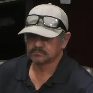 Oscar seated playing mid-stakes cash game poker on the Hustler Casino Live stream.