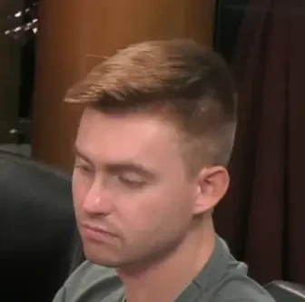 Paint seated playing mid-stakes cash game poker on the Hustler Casino Live stream.