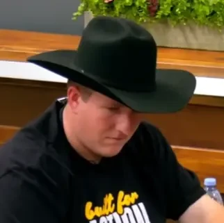 Paul seated playing high stakes cash game poker on the Poker At The Lodge livestream.