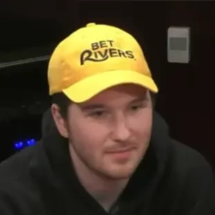 Phillip Hellmuth III "P3" seated playing mid-stakes cash game poker on the Hustler Casino Live stream.