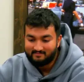 Rahul seated playing mid-stakes cash game poker on the Poker At The Lodge livestream.