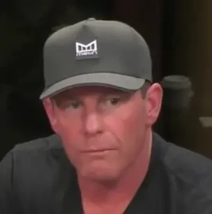 Randy "Lone Wolf" Wolf seated playing mid-stakes cash game poker on the Hustler Casino Live stream.