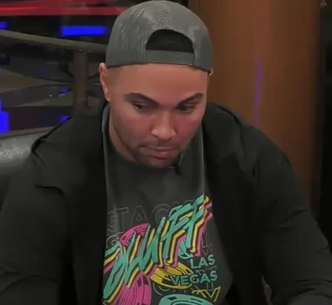 Reggie Mush seated playing high stakes cash game poker on Hustler Casino Live.