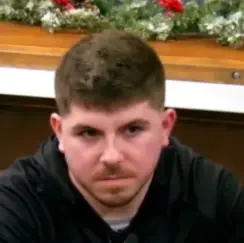 Rick seated playing mid-stakes cash game poker on the Poker At The Lodge livestream.