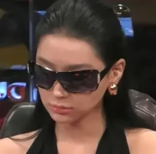 Ritayang seated playing high stakes cash game poker on the Hustler Casino Live stream.