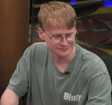 Robby Mier seated playing high stakes cash game poker on Hustler Casino Live