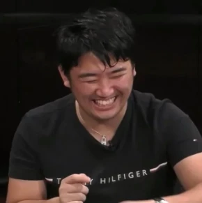 Ryusuke Daifuku seated playing high stakes cash game poker on livestream.