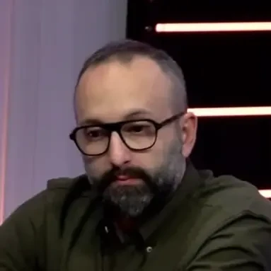 Sebastian Martin seated playing high stakes cash game poker on the Venetian Poker Live stream.