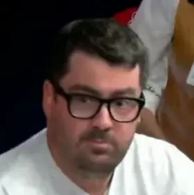 Seinfeld seated playing mid-stakes cash game poker on the Bally Live Poker livestream.