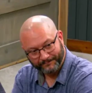 Seth seated playing mid-stakes cash game poker on the Poker At The Lodge livestream.