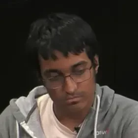 Shiva seated playing high stakes cash game poker on the Hustler Casino Live stream.