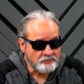 Steady Eddie seated playing mid-stakes cash game poker on the Poker At The Lodge livestream.