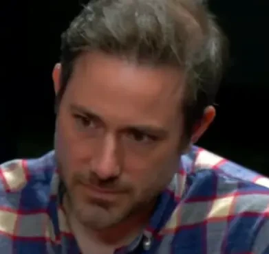 Stephen seated playing mid-stakes cash game poker on the Bally Live Poker livestream